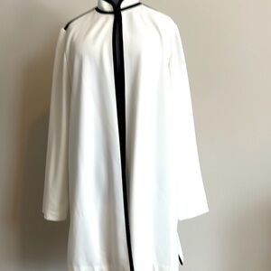 New but no tags. Chico beautiful cream with black trim topper jacket. M size